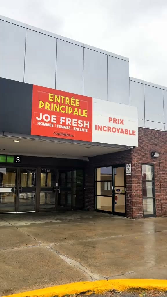 Image officielle de l’entrée principale de la Méga Vente d’Entrepôt Joe Fresh à Place Vertu
